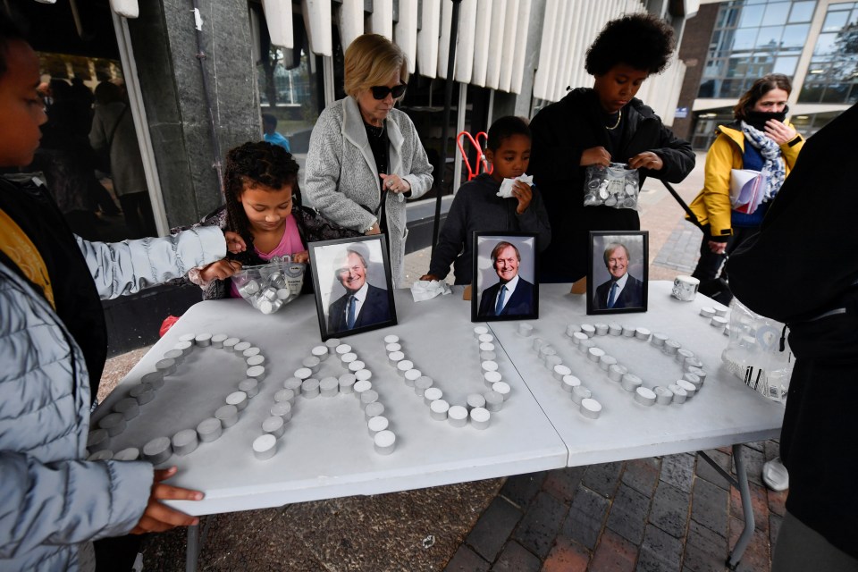 His name was written in candles at the sombre event