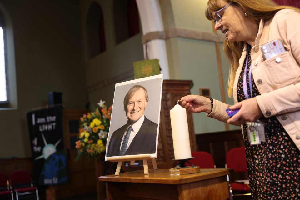 Candle is lit at church memorial for Sir David Amess