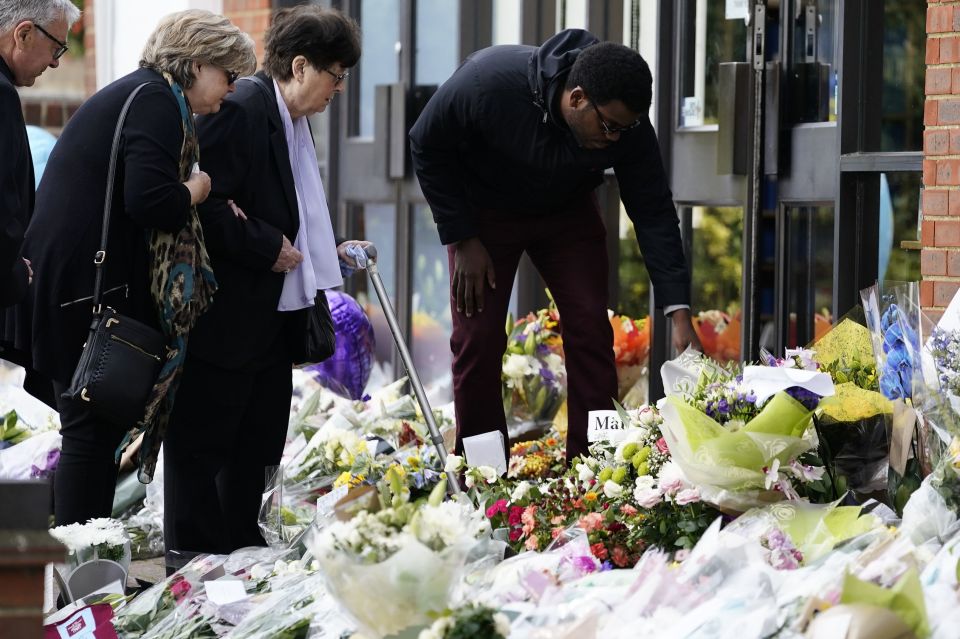 Sir David's family read heartfelt tributes left for the MP at the church