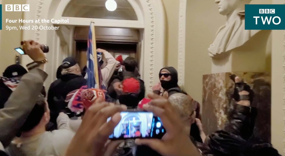 Footage shows rioters trying to bang down the door of the House chamber