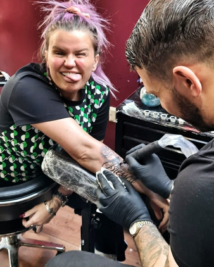 Kerry pulled faces and screamed in pain while getting the half sleeve done on her forearm