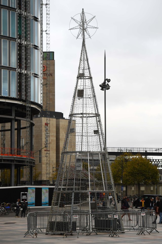 The towering festive decoration has been likened to an electrical pylon