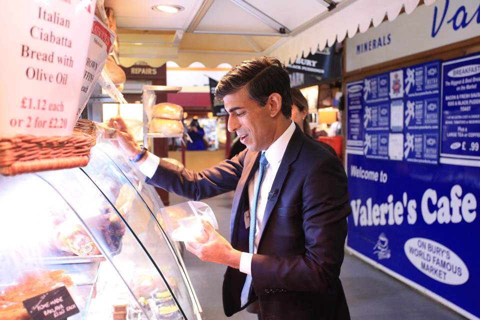 The Chancellor browsing products on his trip to Bury, but the Budget will leave a bitter aftertaste for many middle-earners, according to the respected Institute for Fiscal Studies