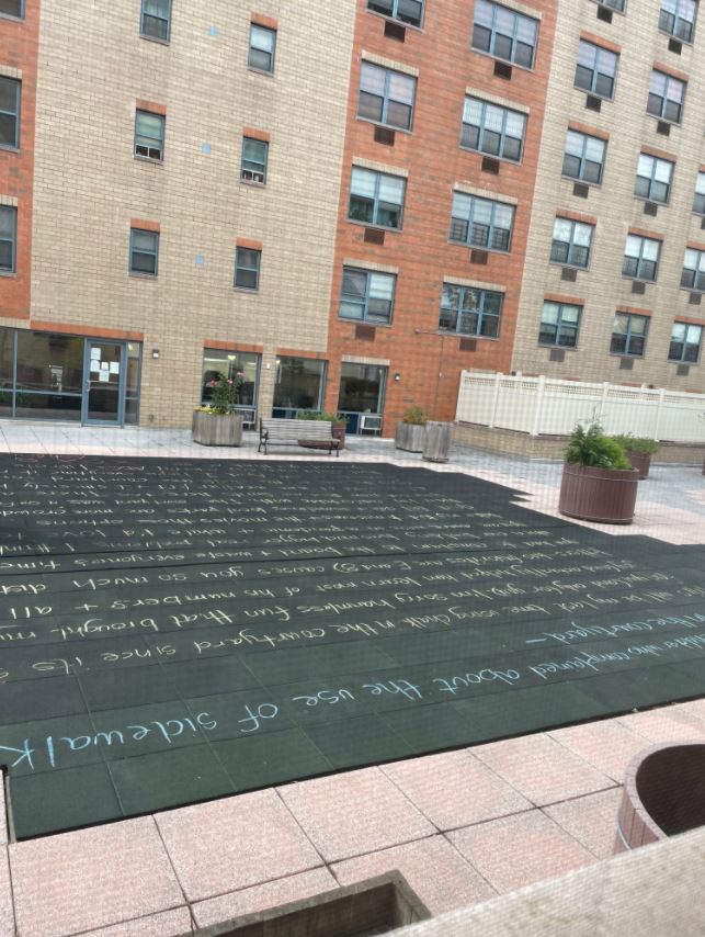 Ashley Woodfolk wrote a letter on the pavement for her neighbour who complained about her toddler's chalk drawings