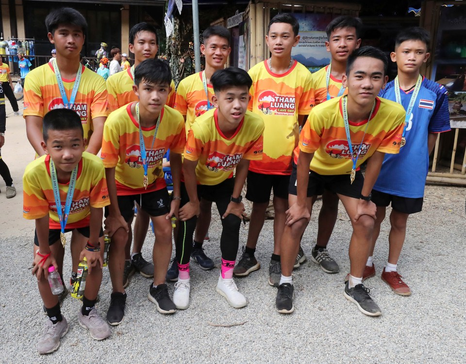 Members of the Wild Boars soccer team who were rescued from the flooded cave after many failed attempts to escape