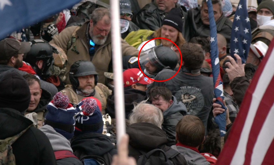 The moment officer Mike Fanone is dragged into the mob and tasered