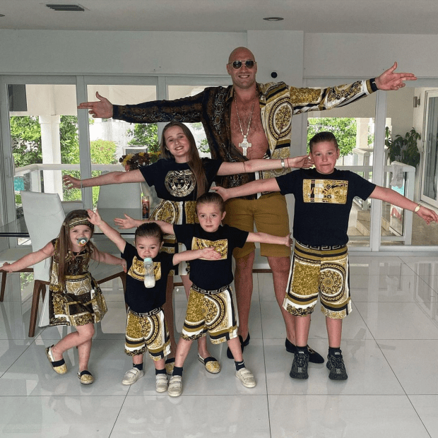 The Fury clan all pose together in matching Louis Vitton outfits that cost thousands