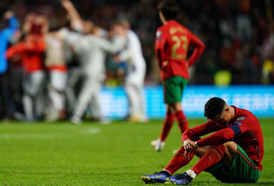 Ronaldo looks devastated after losing out on an automatic qualification spot