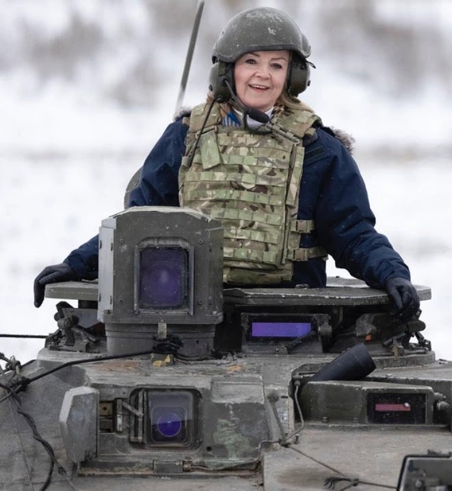 Foreign Secretary Liz Truss sported a helmet and armoured vest as she said Britain will 'stand against Russia's malign activity'