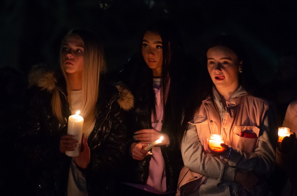 Young girls paid their respects during the emotional evening