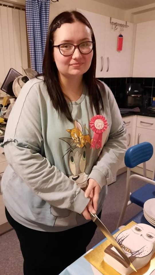 Laura celebrating after her breast reduction surgery