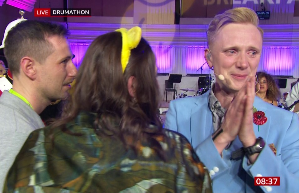 He was comforted by husband Arran Rees after the Children In Need epic