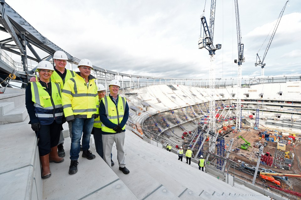 Levy, centre, took a hands on approach to ensuring the Tottenham Hotspur Stadium was built to his specifications