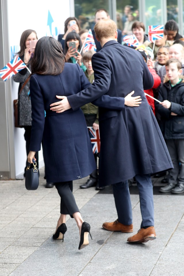 Meghan left the stitch in the back of her coat in March 2018