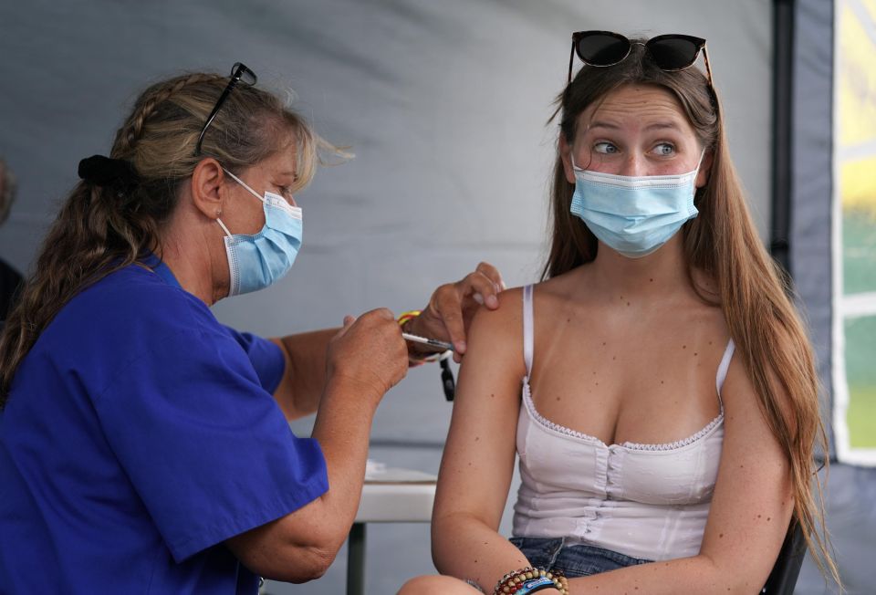 Teens between 16 and 17 can get a second dose of the vaccine. Pictured: 16 year old festival goer Lottie Beard getting her first dose