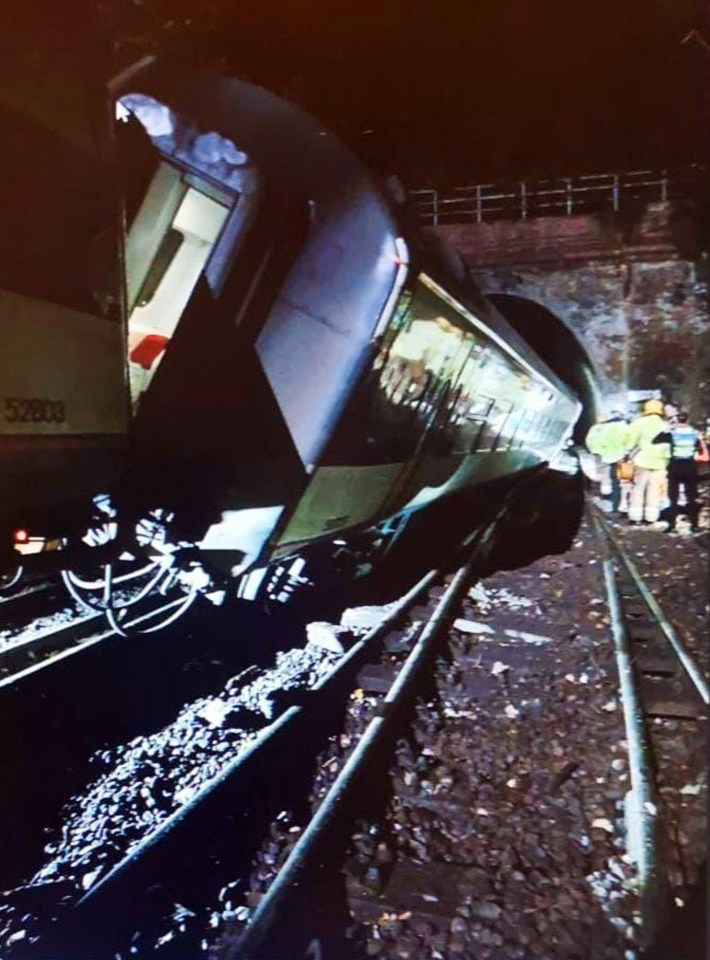 Terrifying photos from the track show the carriage tilting close to the rail