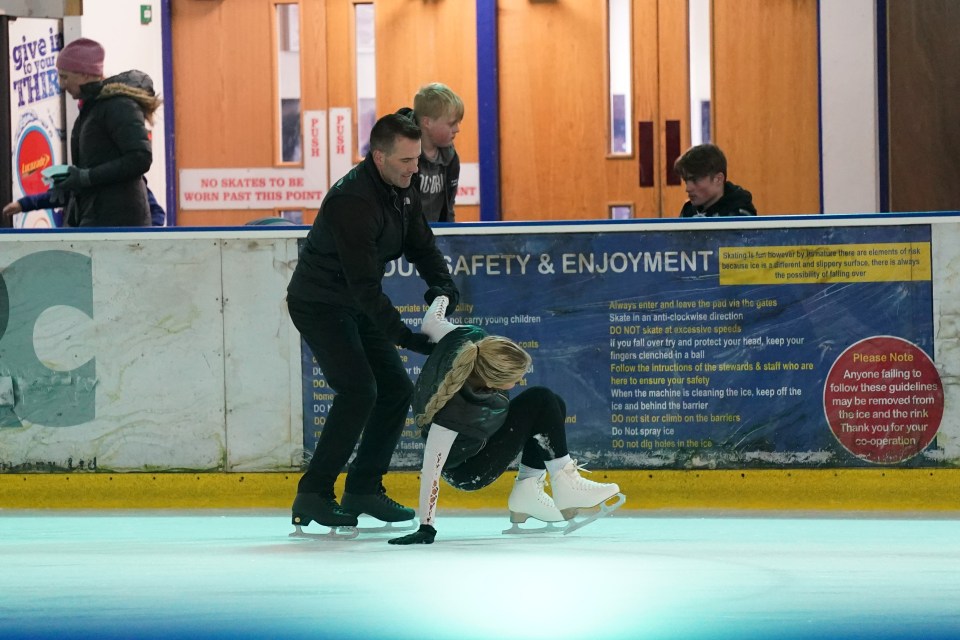 She got a helping hand from her coach after she took a spill