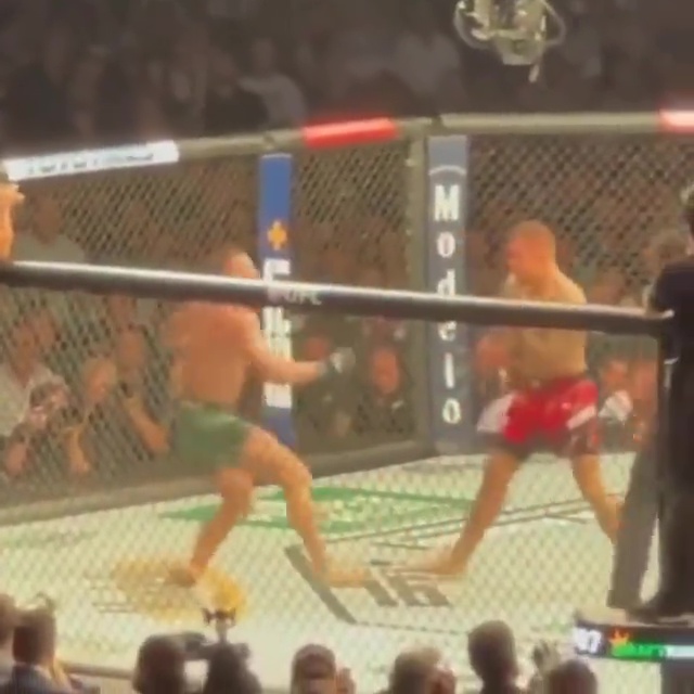 McGregor winces in agony as his left leg gives way