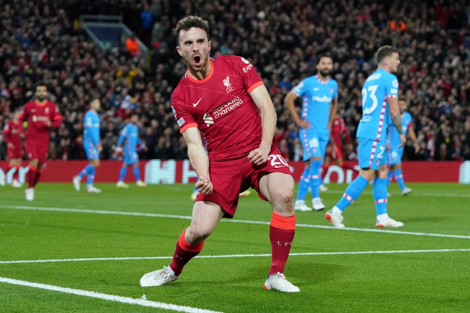 Jota celebrates nodding Liverpool ahead at Anfield