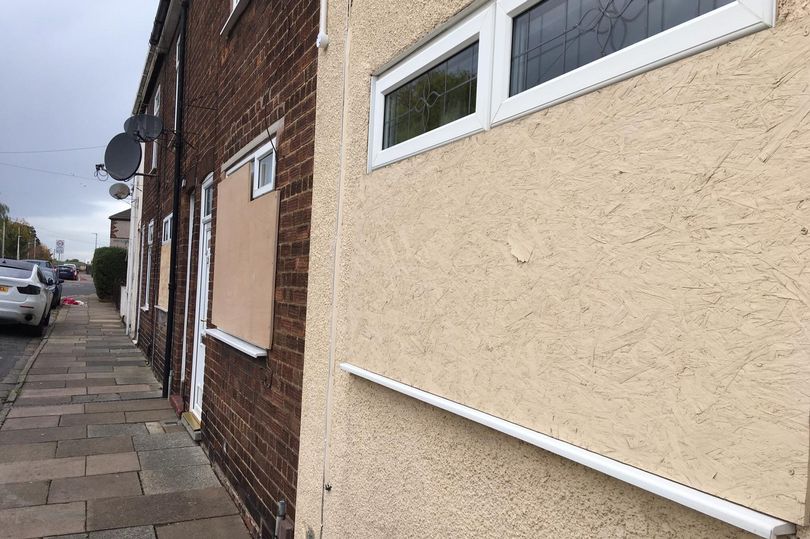 Locals living on Macaulay Street in Grimsby, Lincs, have boarded up their own windows