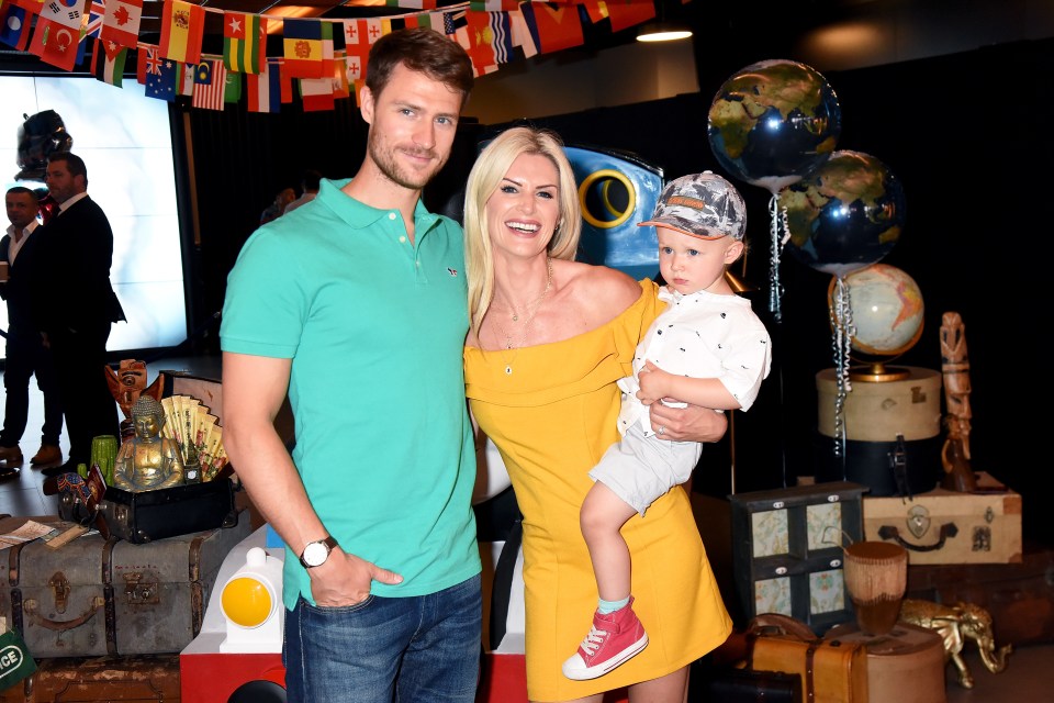 Sarah pictured with her husband Jonathan and their son in 2018