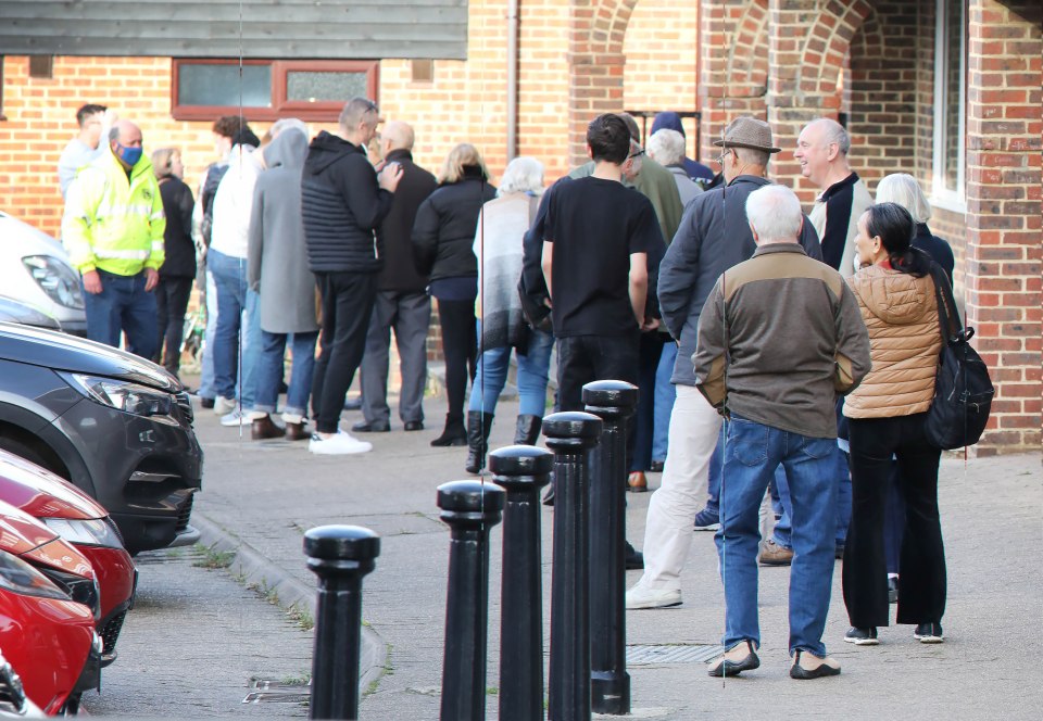 People wait for their Covid booster jab in Maidstone, Kent