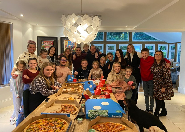 Kerry Katona shared a rare photo with her huge family eating takeaway