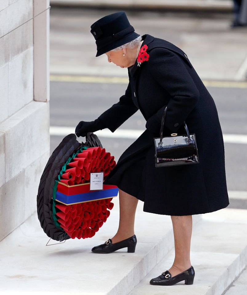 She used to lay the wreath herself but Prince Charles has since taken over