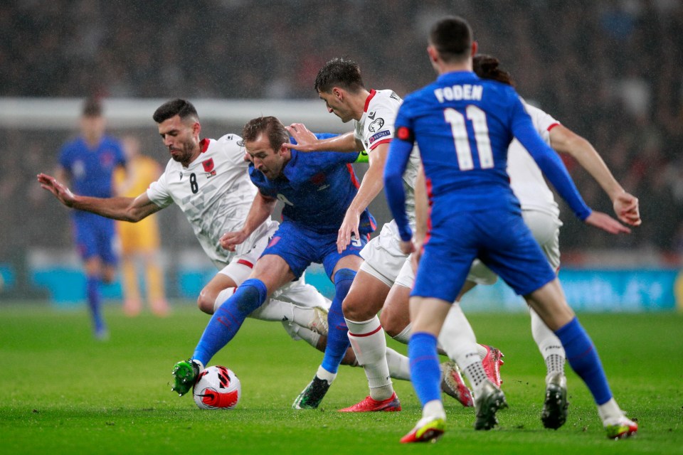 England wore their blue away kit at home against Albania - with the visitors wearing white