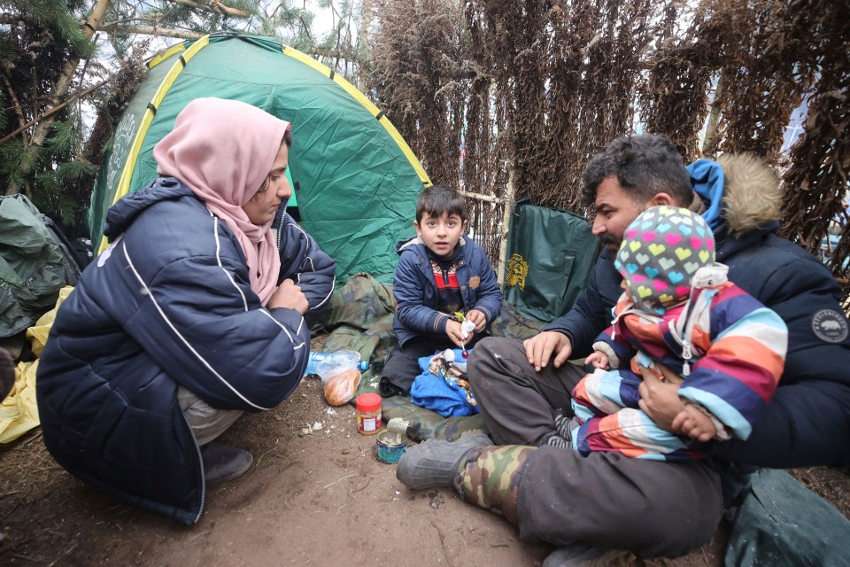 One of the many migrant families at the Belarus-Poland border