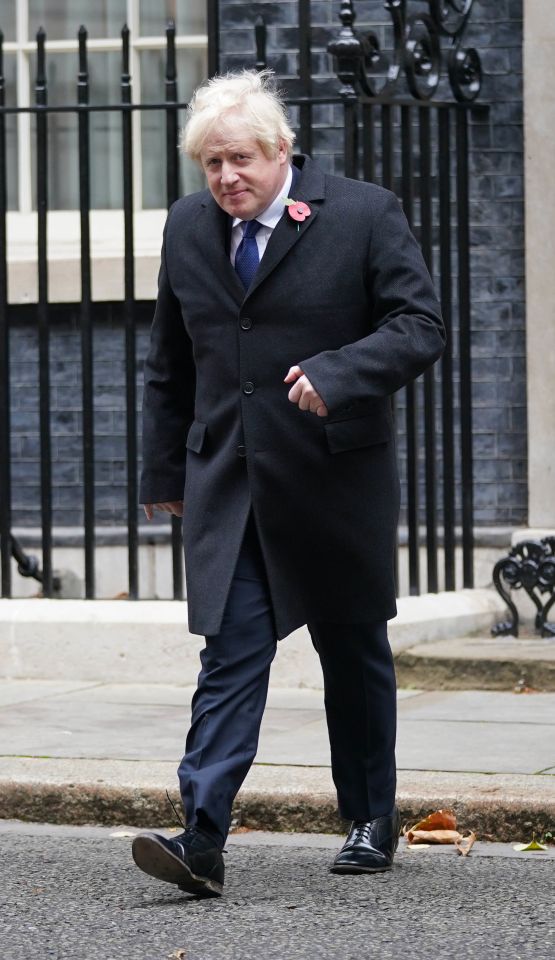 Boris Johnson leaves Downing street this morning to attend a Remembrance Sunday event