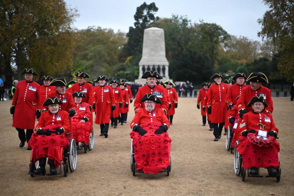 Veterans from the Chelsea Pensioners on their way to the Cenotaph