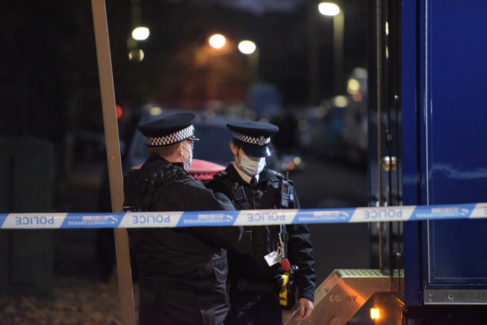 More than a dozen officers sealed off the street