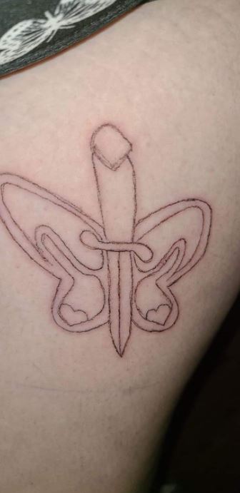 Do you see a butterfly and a dagger?