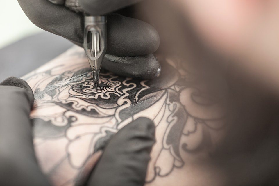 `Tattoos often require a steady hand for intricate work