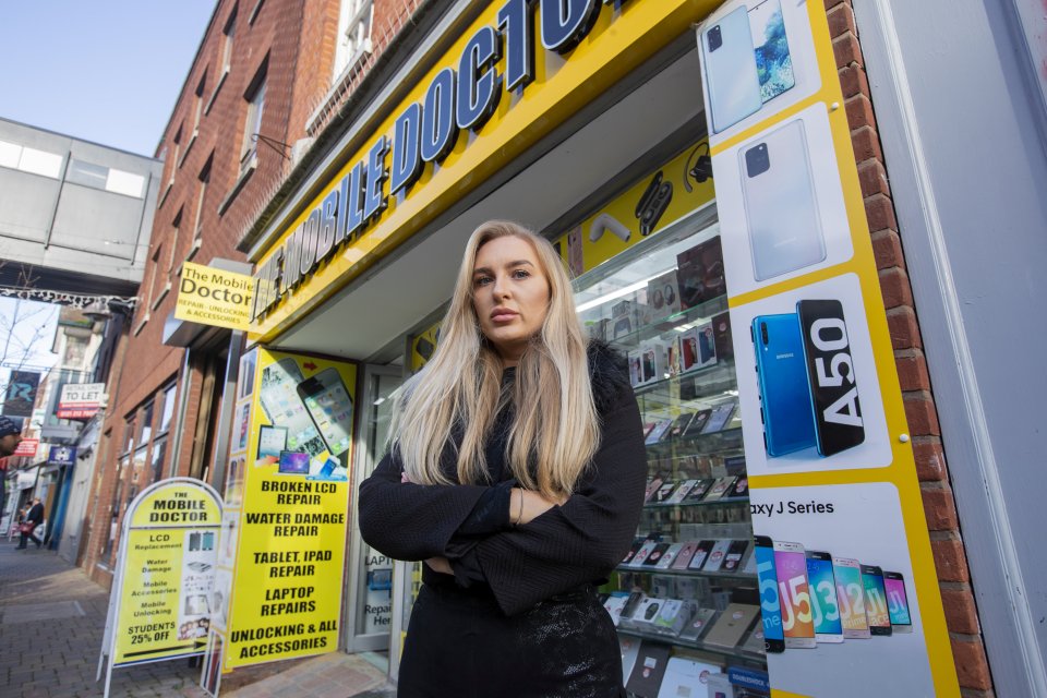 Louise poses outside the phone shop where the incident occurred