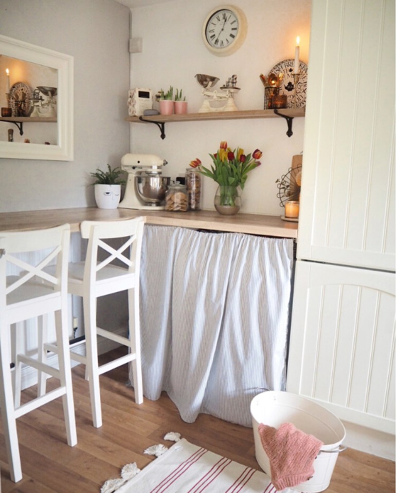 If you have bulky white goods creating an eyesore in the kitchen, apply hooks either side, grab a bit of fish wire and cover with a cute, patterned net curtain