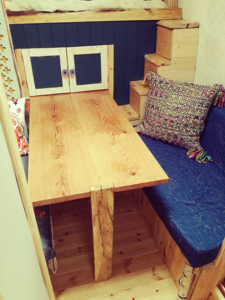 They used reclaimed furniture including the table which came from a church