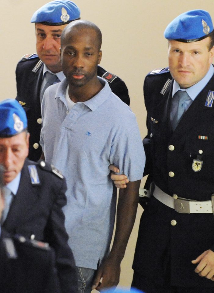 Convicted murderer Rudy Guede arrives at a court hearing in Perugia in 2008