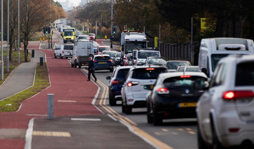 Cars can be seen veering off the road in a bid to have space