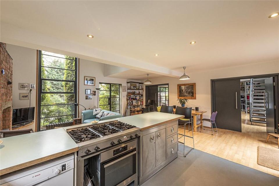 Walls appear to have been knocked down to create a huge open plan kitchen