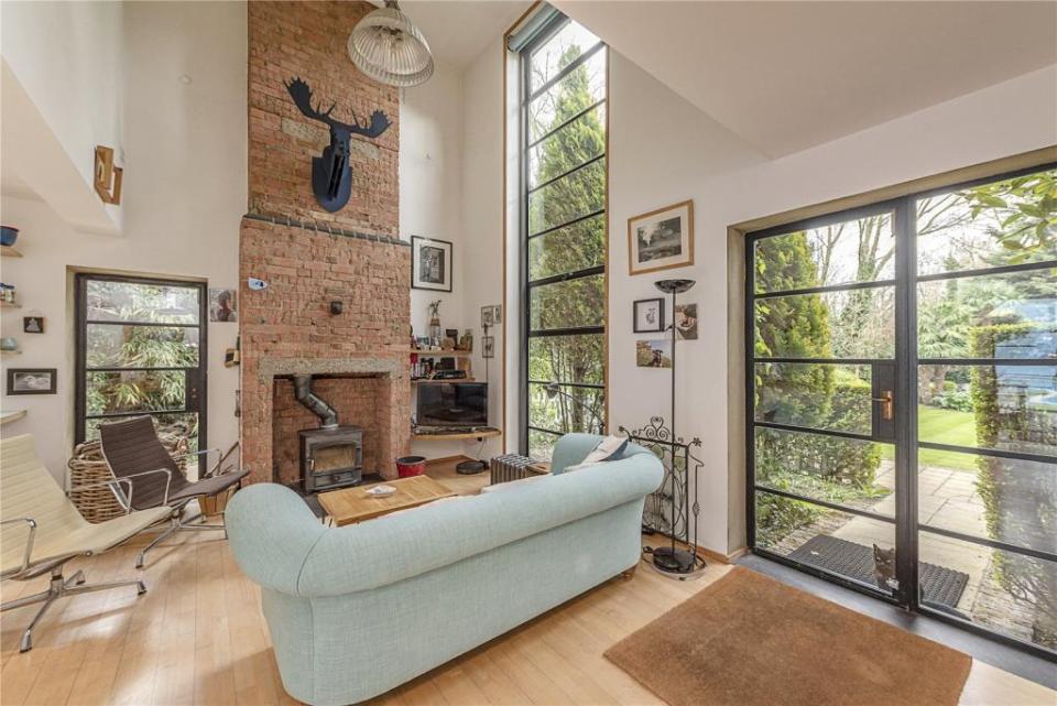 The fireplace and living area is unrecognisable to the hit 90s show with Denise van Outen