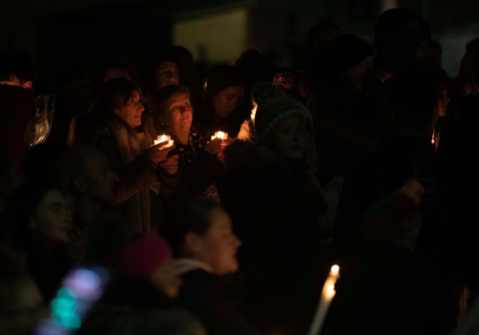 Mourners gathered around in tears as they supported Bobbi's family