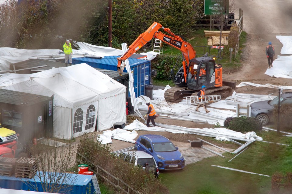 Workmen spent yesterday desperately trying to make repairs