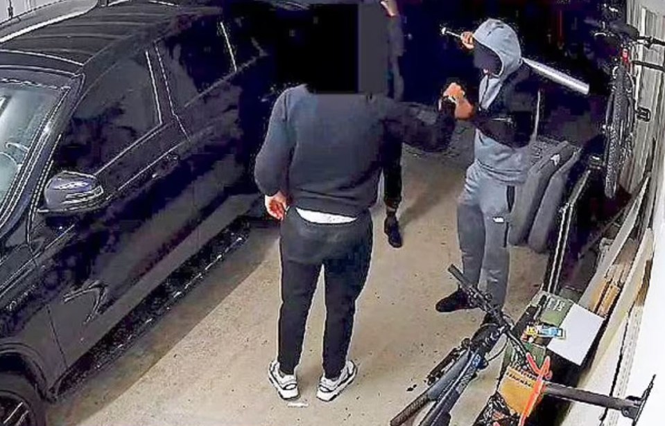 CCTV shows the moment Gabriel hands his car keys and watch to the armed robber