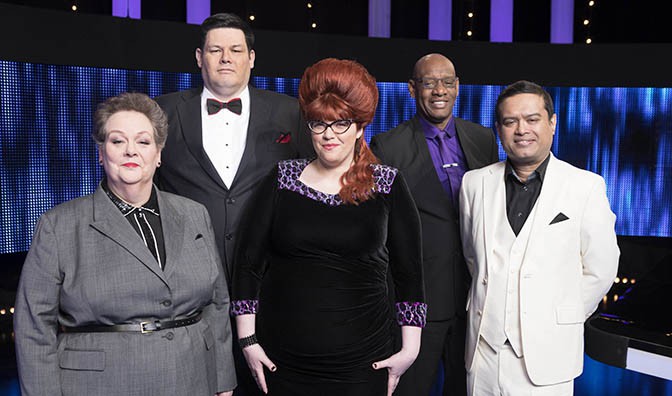 With his co-stars on The Chase