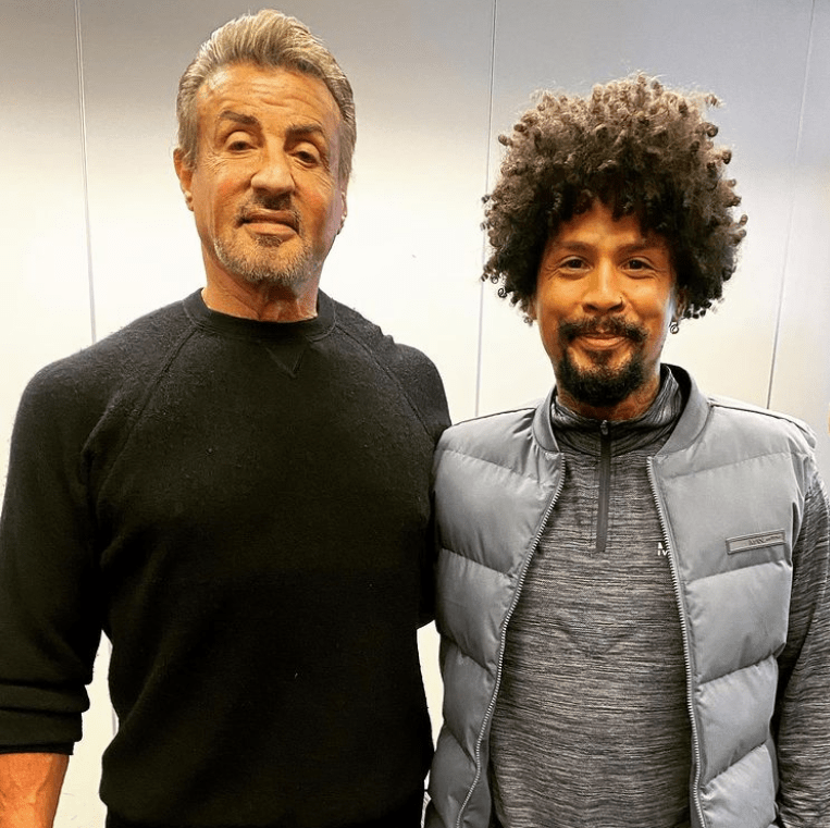 Cleveland still enjoys a showbiz life - seen here with Sly Stallone