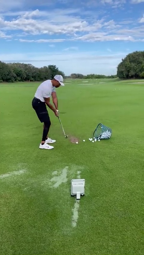 It's the first time Woods has been seen publicly hitting a golf ball since his car accident earlier this year