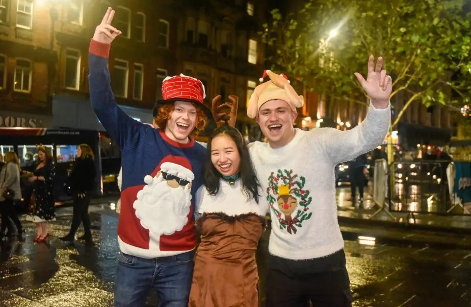 Revellers pictured beaming on a night out