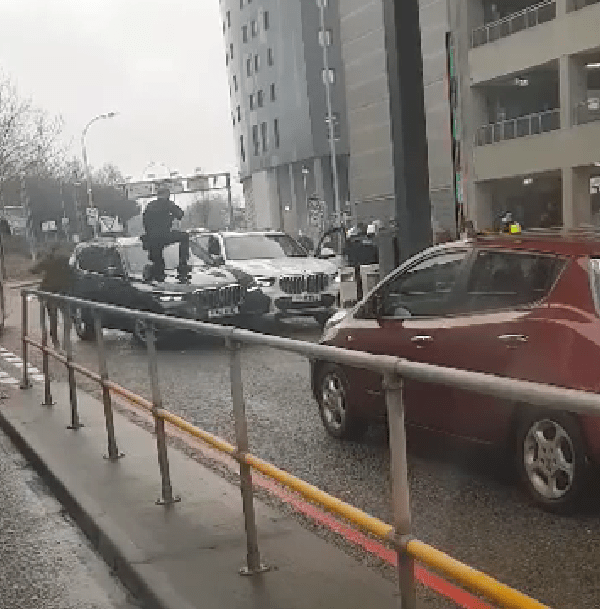 This is the shocking moment armed police halted a vehicle after it was driven into oncoming traffic close to the arrivals hall at Gatwick